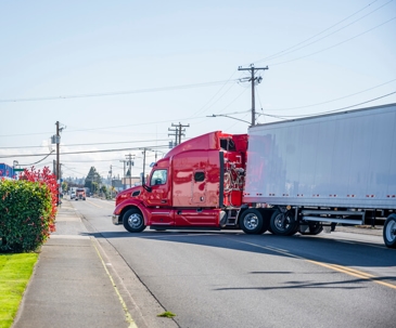 red semi truck turning