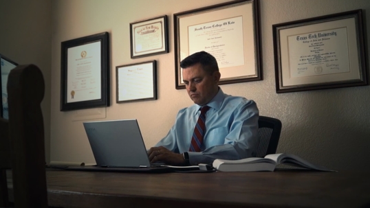 Clark Harmonson at his desk